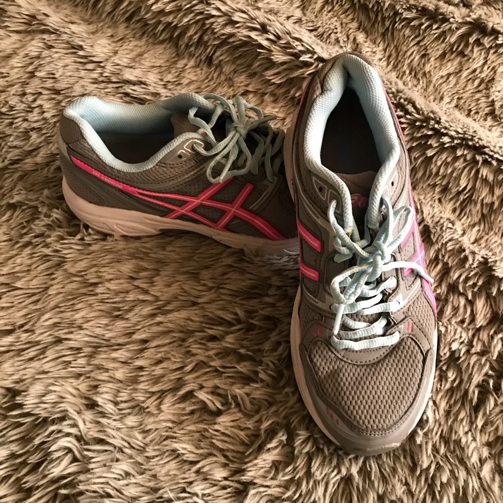 ASICS sneakers.